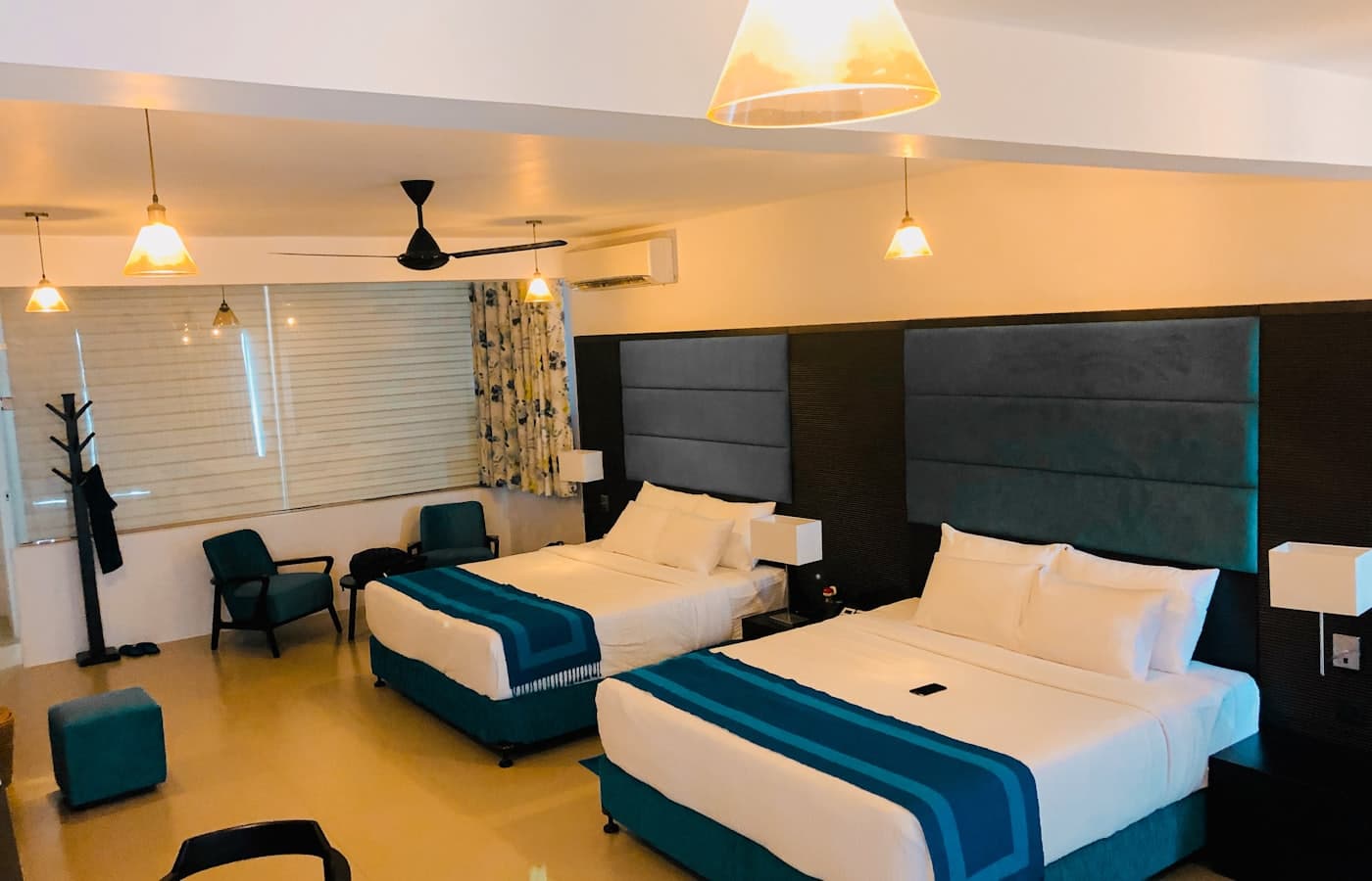 A verified hostel room, freshly made