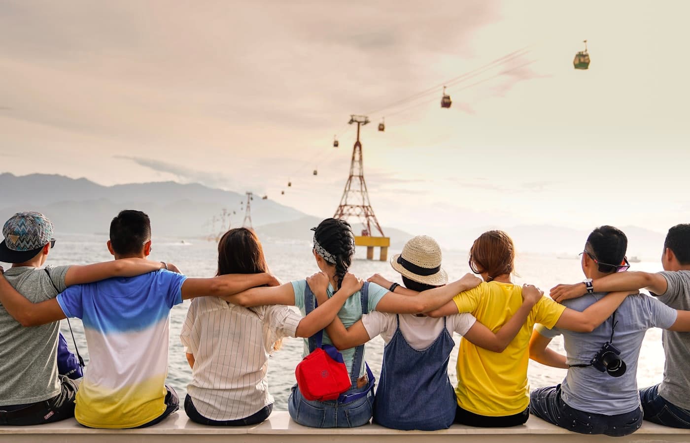 Friends looking out over a city view together